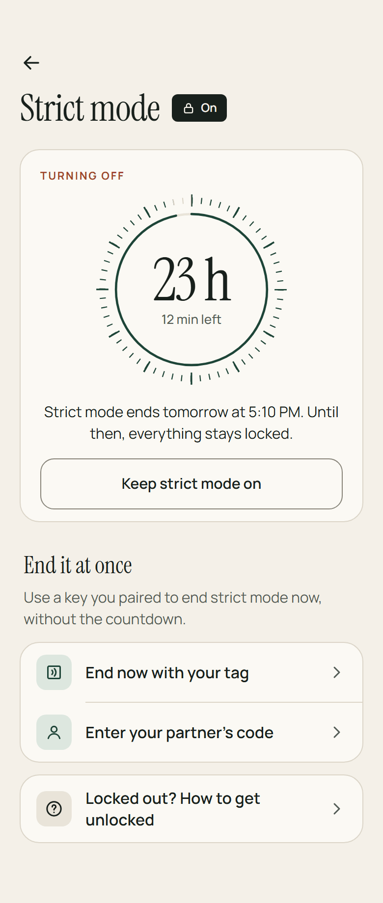 Strict mode, on and turning off. A dial reads 23 hours, 12 minutes left, and strict mode ends tomorrow at 5:10 PM — until then everything stays locked. Below it, Keep strict mode on, and two ways to end it at once: with your NFC tag, or your partner's code.