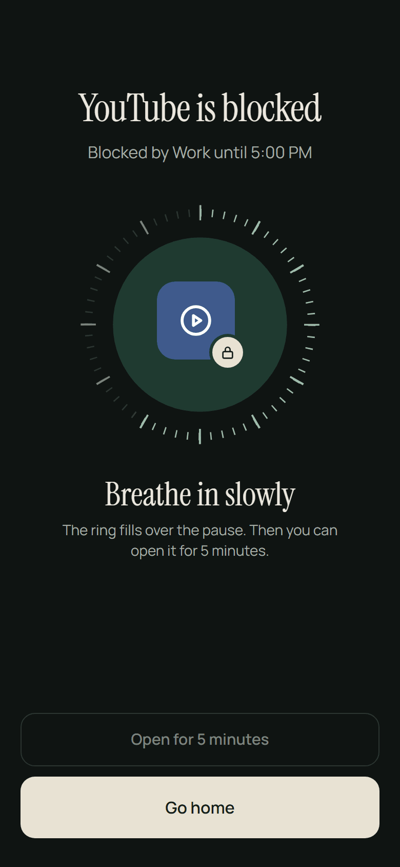 The block screen at its first level, in the dark theme. YouTube is blocked by Work until 5:00 PM. Breathe in slowly: the ring fills over the pause, and then it can be opened for 5 minutes.